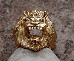 large 14K gold lion king ring with diamonds